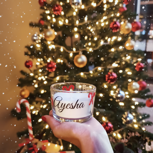 Personalised Christmas candle with candy cane design and custom name. Ideal for festive décor, gifting, hampers, and thoughtful holiday keepsakes.