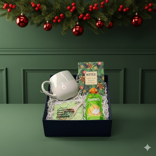 Cozy Calm Christmas Hamper with ceramic mug, journal & self-care essentials. A thoughtful festive gift for Secret Santa, friends and colleagues.