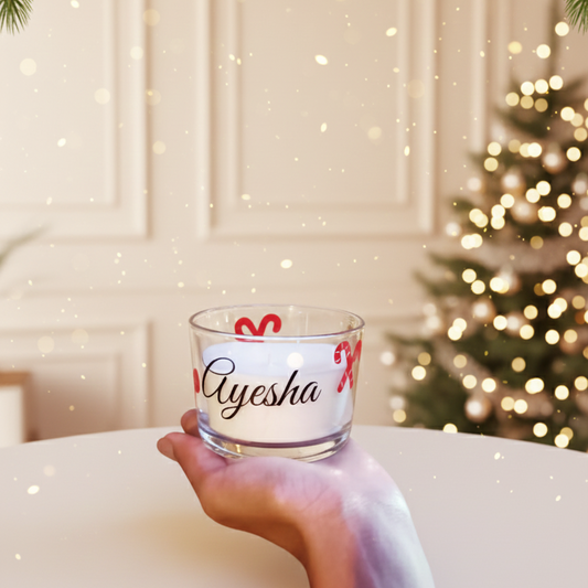Personalised Christmas candle with candy cane design and custom name. Ideal for festive décor, gifting, hampers, and thoughtful holiday keepsakes.