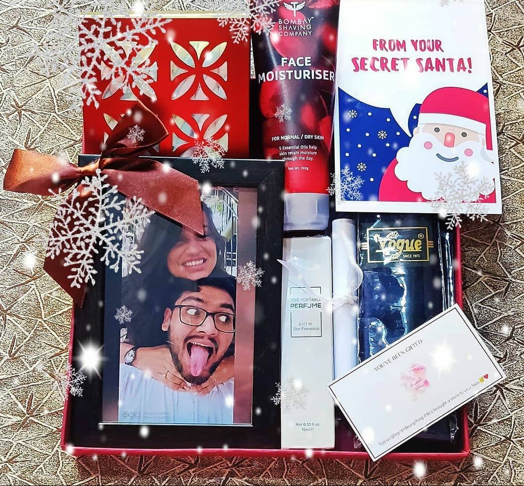 Personalised Secret Santa gift hamper with photo frame, grooming essentials and chocolates. A thoughtful Christmas gift for him or friends.